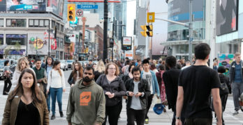 Crowds Of People In A City Centre