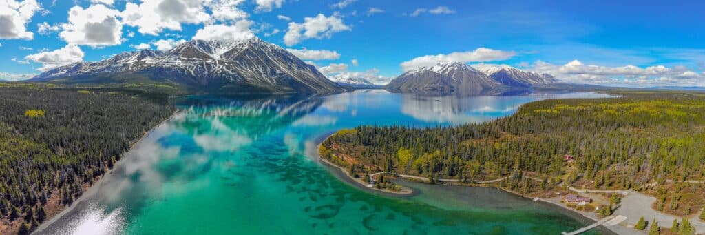 Panoramic view of mountains and river in Yukon