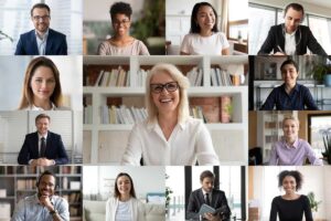 A collage of a group of business people, all smiling at the cameras