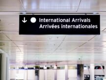 A sign indicating international arrivals for those entering Canada.