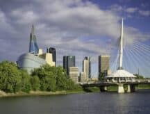 A bridge and buildings near a water body