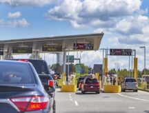 Cars on the road ahead of a border crossing