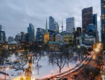 A cityscape of Toronto with snow.