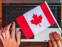 The Canadian flag on a laptop keyboard