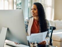 A professional lady doing her course work from her study permit exempt educational program.